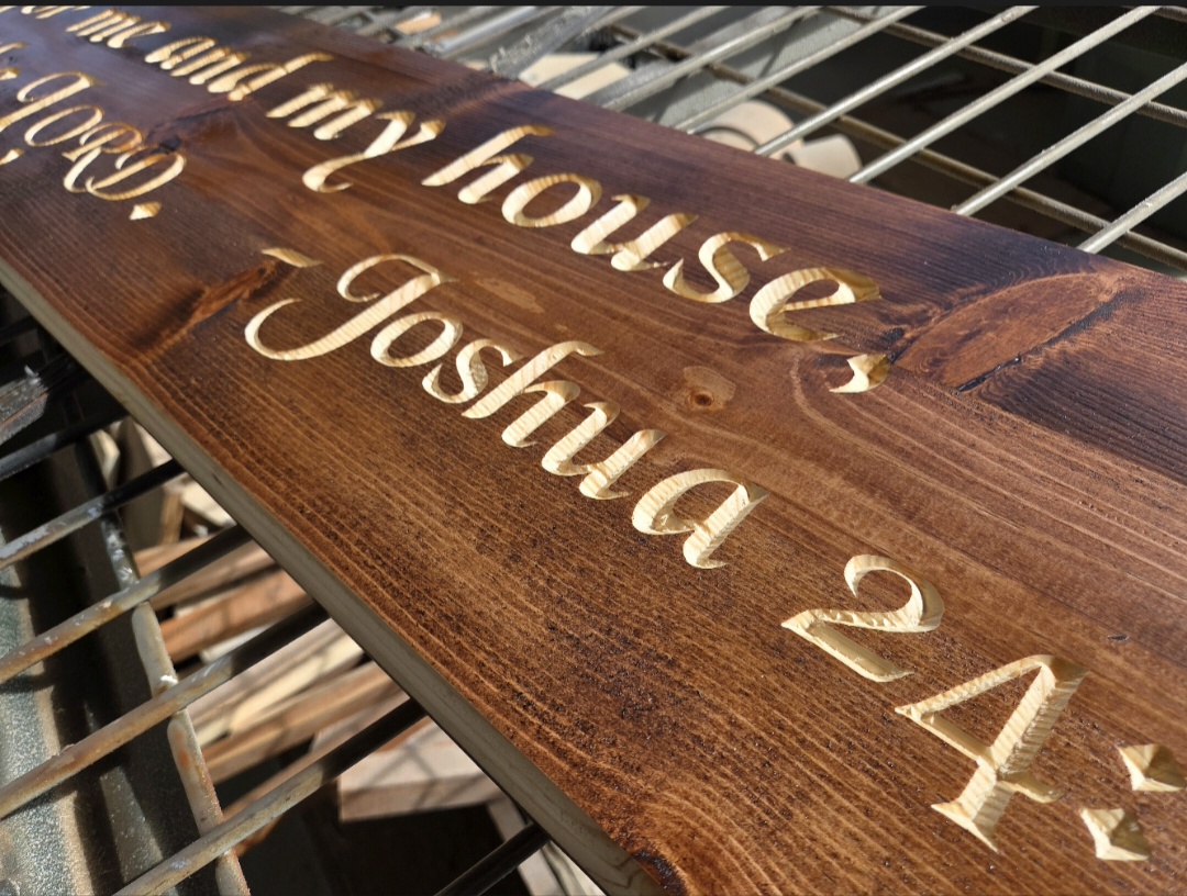 Carved Joshua 24:15 scripture sign in stained wood