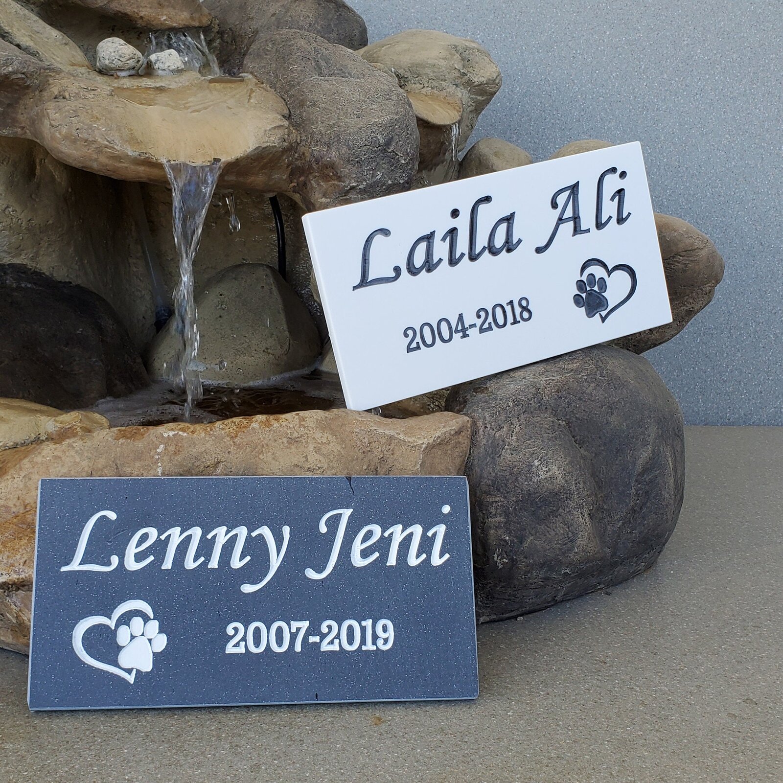 Weatherproof Corian pet memorial grave markers with name and dates