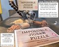 The Impossible Jigsaw Puzzle - Ultimate White Elephant Gag Gift